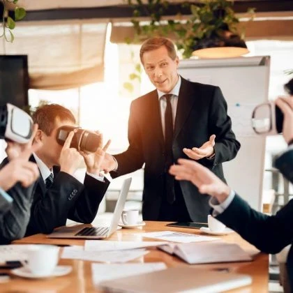 Virtual reality headset displaying an immersive business communication environment.