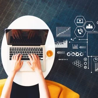 Birdseye view of someone working on a laptop