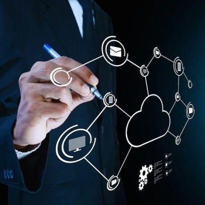 Person writing on a board showing cloud infrastructure