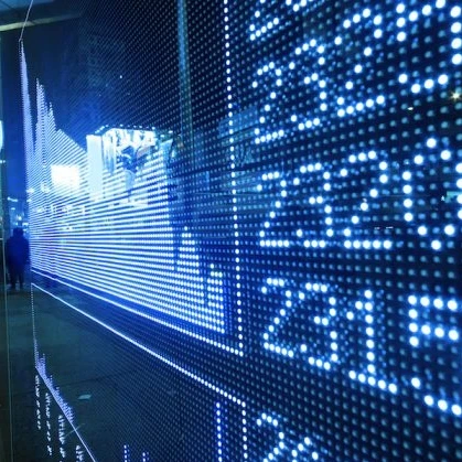 Stocks showing on a screen with visual numbers showing the stock data next to it